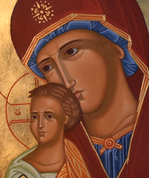 Utsnitt av ikon som visar jungfru Marias ansikte och Jesusbarnets ansikte.